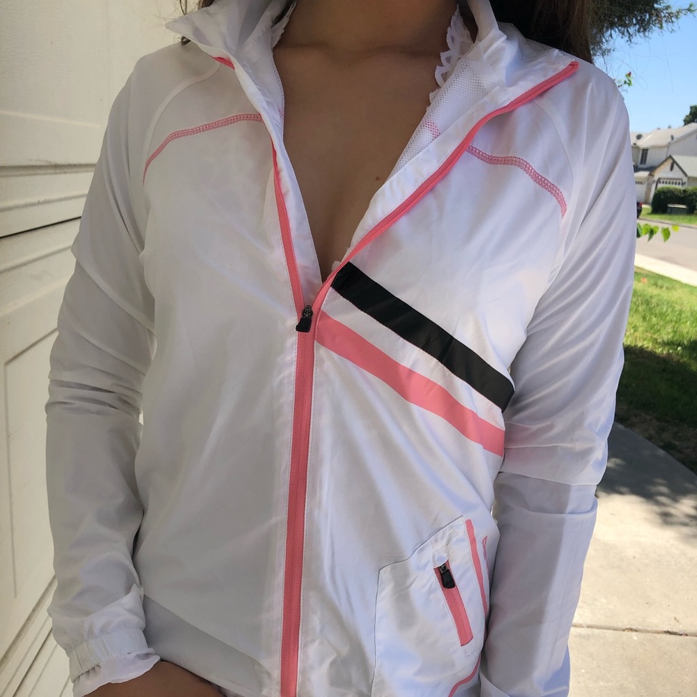 white windbreaker